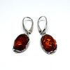 Amber Earrings with a Wave of Filigree in Silver