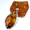 Unique Modern Amber Pendant in Silver Setting
