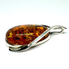 Large Baltic Amber Pendant in Silver Wishbone Setting