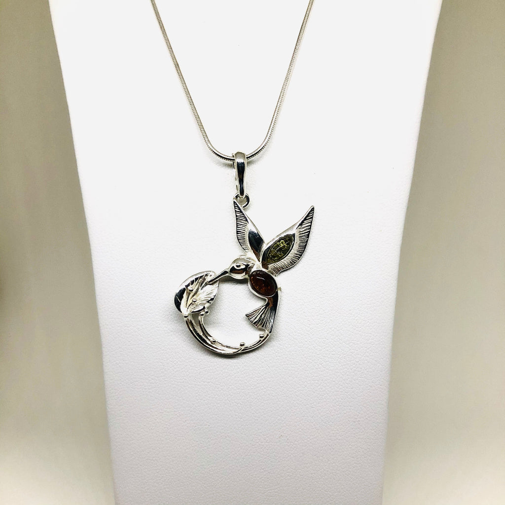 Hummingbird and a Flower Pendant in Silver and Amber