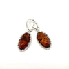 Amazing Amber Earrings in a Crown-Like Silver Setting