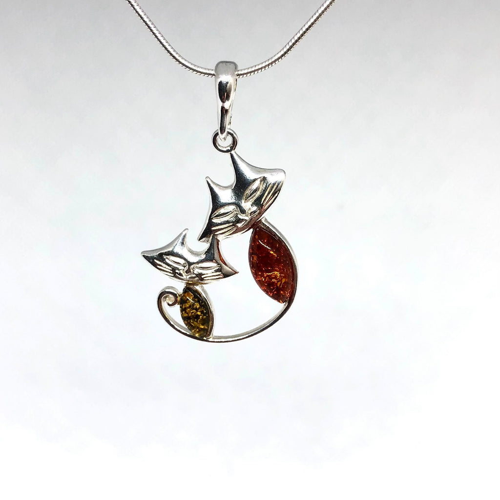 Two Smiling Cats Pendant in Silver and Amber