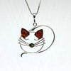 Sleeping Cat Pendant in Silver with Amber