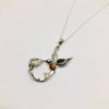 Hummingbird and a Flower Pendant in Silver and Amber