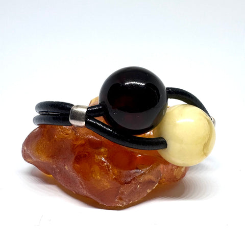 Two Amber Balls Bracelet on Leather (cherry and butter)