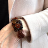 Amber Beaded Bracelet on Brown Linen