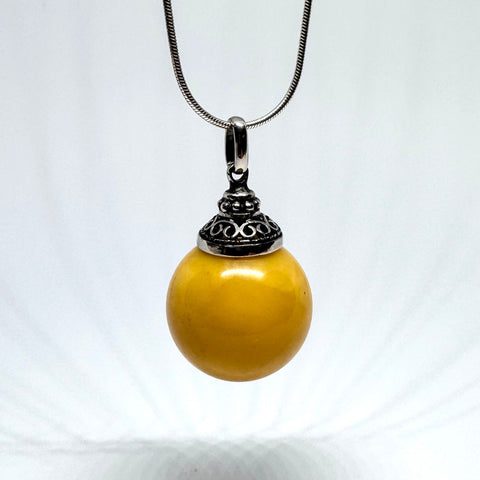 Butter Amber Ball Pendant in Filigree Setting