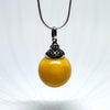 Butter Amber Ball Pendant in Filigree Setting