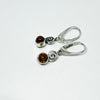 Round Amber Earrings with a Silver Swirl