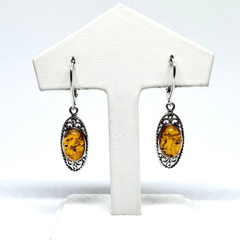 Amber Oval Hanging Earrings in Silver Filigree Frame