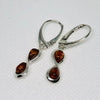 Infinity Earrings in Silver with Amber