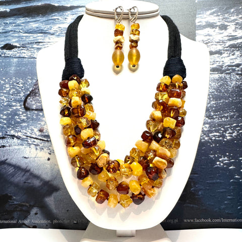 Multistrand Hewed Amber Necklace on Black Cord