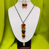 Five Amber Balls on Black Cord Necklace