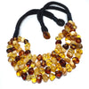 Multistrand Hewed Amber Necklace on Black Cord