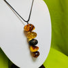 Five Amber Balls on Black Cord Necklace