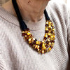 Multistrand Hewed Amber Necklace on Black Cord