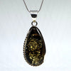 Elongated Green Amber Pendant in Silver