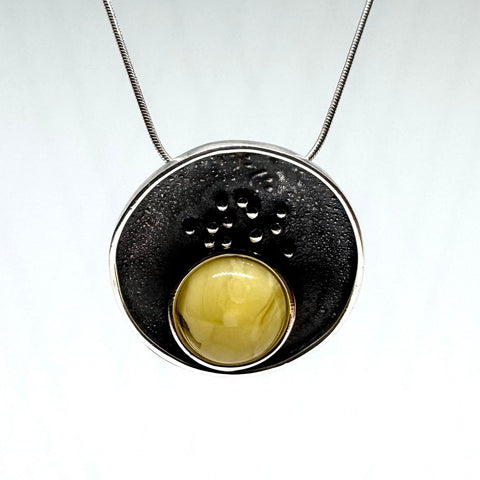Butter Amber Round Pendant in Oxidized Silver Setting