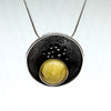 Butter Amber Round Pendant in Oxidized Silver Setting