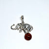 Elephant on a Ball Pendant in Silver