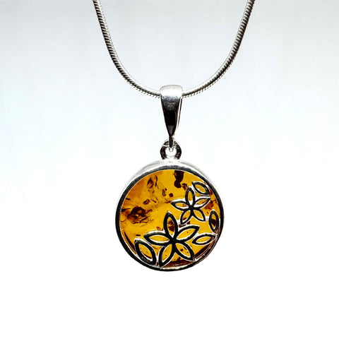 Amber Pendant with Flower Design in Silver