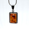 Rectangular Amber Pendant in Silver Rope Setting