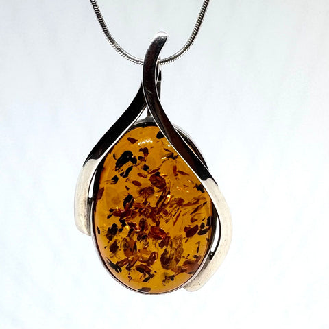 Unique Amber Pendant in Wishbone Silver Setting