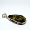 Elongated Green Amber Pendant in Silver