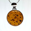 Round Amber Pendant in Sterling Silver