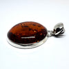 Round Amber Pendant in Sterling Silver