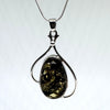 Green Amber Pendant with Silver Wires Decoration