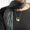Butter Amber Round Pendant in Oxidized Silver Setting