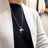 Elephant on a Ball Pendant in Silver
