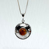 Amber Pendant in Unique Silver Setting