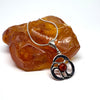 Delicate Celtic Pendant with Amber