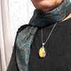 Butter Amber Pendant in Unique Silver Setting