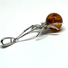 "Black Widow" Spider Pendant in Silver with Amber