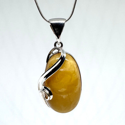 Butter Amber Pendant in Unique Silver Setting
