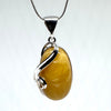 Butter Amber Pendant in Unique Silver Setting