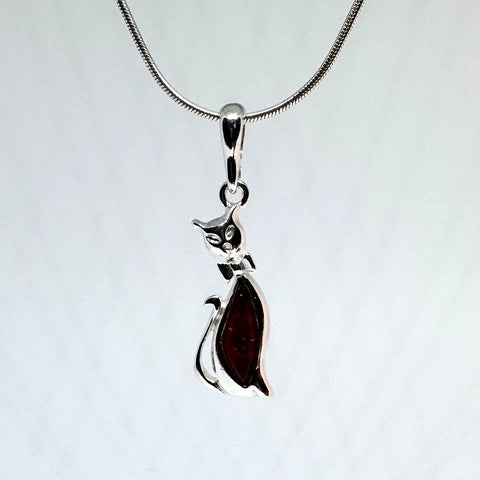 Cat with a Bow Pendant in Silver with Amber