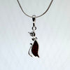 Cat with a Bow Pendant in Silver with Amber