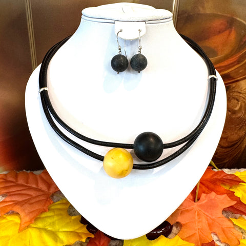 Two Amber Balls on Leather Necklace in Mat (black & butter)
