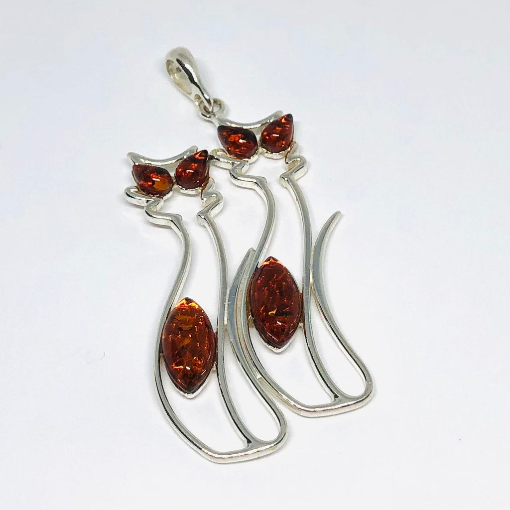 Two Cats Pendant in Silver with Amber