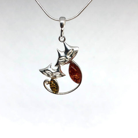 Two Smiling Cats Pendant in Silver and Amber