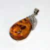 Large Amber Pendant with a Silver Leaf