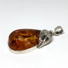 Large Amber Pendant with a Silver Leaf