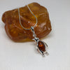 Penguin Pendant in Silver with Amber