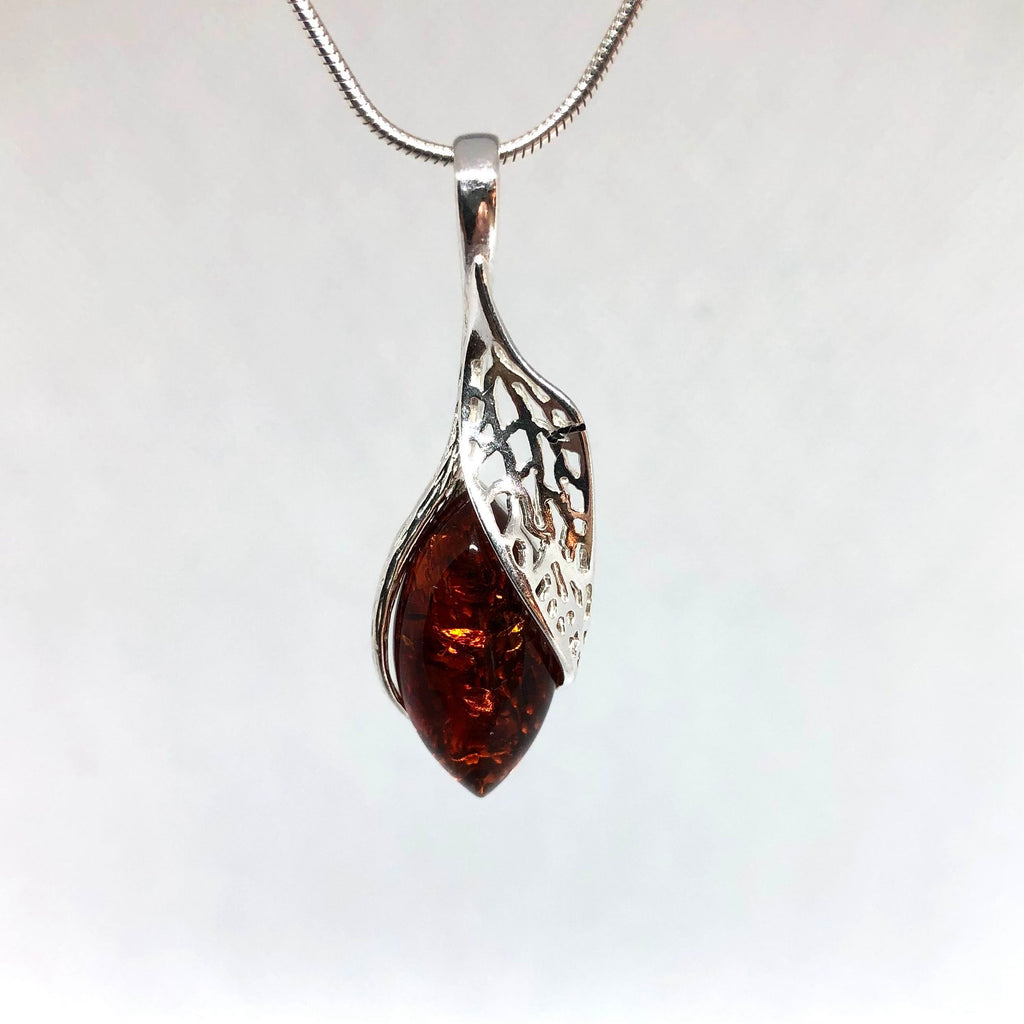Amber Pendant with a Silver Leaf