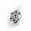 Baltic Amber Silver Flower Locket Pendant available at The Amber Room