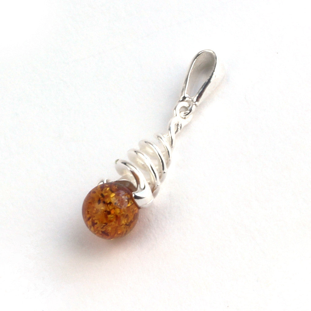 Baltic Amber Round Stone Silver Swirl Pendant available at The Amber Room